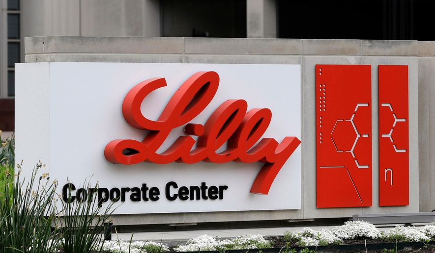 A sign for Eli Lilly & Co. stands outside their corporate headquarters in Indianapolis on April 26, 2017. (AP Photo/Darron Cummings) **FILE**