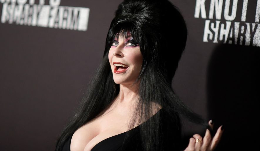 FILE - Cassandra Peterson appears at the 2016 Knott's Scary Farm Black Carpet Event at Knott's Berry Farm in Buena Park, Calif., on Sept. 30, 2016, (Photo by Richard Shotwell/Invision/AP, File)