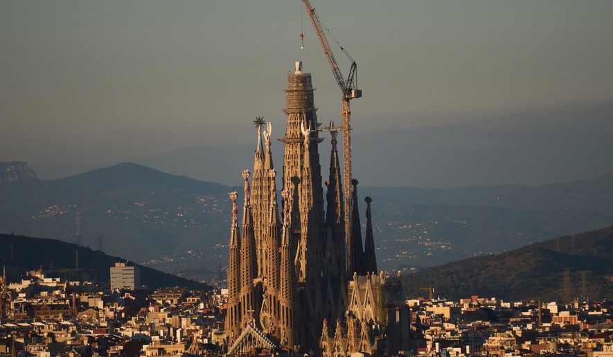 View of the Sagrada Familia basilica, which became the world's tallest church on Thursday after a section of its central tower was lifted into place, in Barcelona, Spain, Oct. 30, 2025. (AP Photo/Emilio Morenatti)