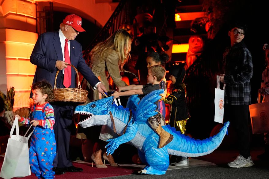 President Donald Trump and first lady Melania Trump participate in a Halloween at the White House event on the South Lawn, Thursday, Oct. 30, 2025, in Washington. (AP Photo/Alex Brandon)