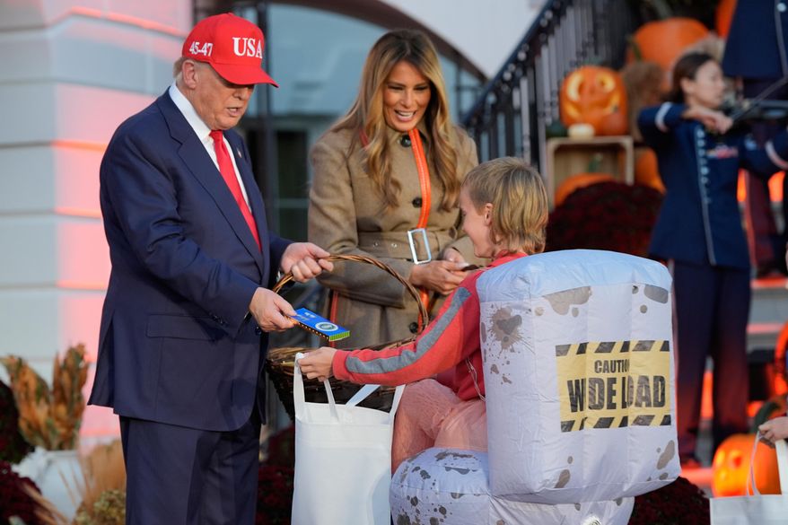 President Donald Trump and first lady Melania Trump participate in a Halloween at the White House event on the South Lawn, Thursday, Oct. 30, 2025, in Washington. (AP Photo/Alex Brandon)