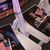 Signs with a photo of Charlie Kirk are seen before Vice President JD Vance speaks at a Turning Point USA event at the Pavilion at Ole Miss at the University of Mississippi in Oxford, Miss., Wednesday, Oct. 29, 2025. (Jonathan Ernst/Pool via AP)
