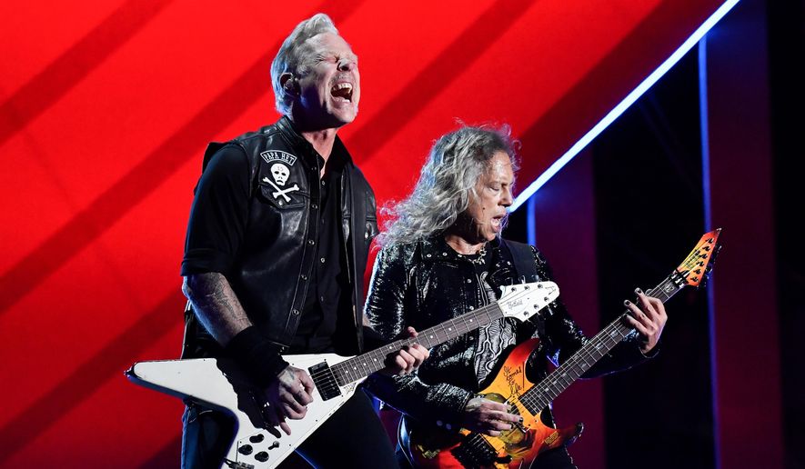 James Hetfield, left, and Kirk Hammett of Metallica perform during the Global Citizen Festival on Saturday, Sept. 24, 2022, at Central Park in New York. Metallica's latest album, "72 Seasons," releases Friday. (Photo by Evan Agostini/Invision/AP, File)