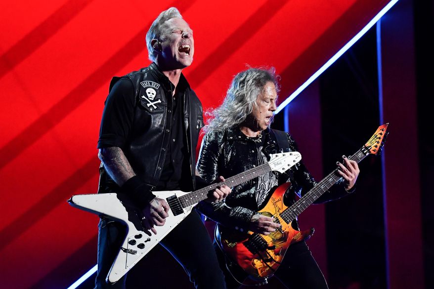 James Hetfield, left, and Kirk Hammett of Metallica perform during the Global Citizen Festival on Saturday, Sept. 24, 2022, at Central Park in New York. Metallica's latest album, "72 Seasons," releases Friday. (Photo by Evan Agostini/Invision/AP, File)