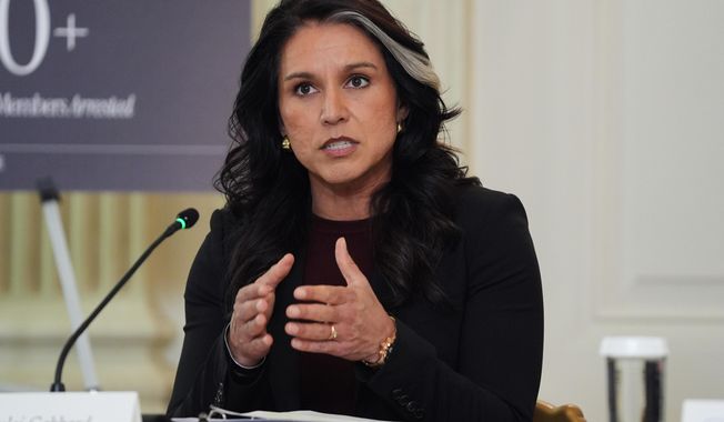 Director of National Intelligence Tulsi Gabbard speaks during a roundtable on criminal cartels with President Donald Trump in the State Dining Room of the White House, Thursday, Oct. 23, 2025, in Washington. (AP Photo/Evan Vucci)