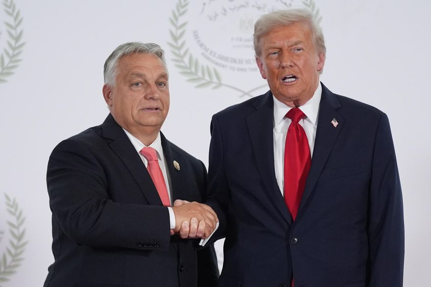 President Donald Trump greets Hungary's Prime Minister Viktor Orban during a summit to support ending the more than two-year Israel-Hamas war in Gaza after a breakthrough ceasefire deal, Monday, Oct. 13, 2025, in Sharm El Sheikh, Egypt. (AP Photo/Evan Vucci, Pool)