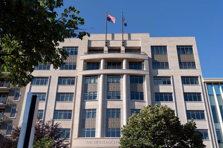 An American flag is seen upside down at the conservative Heritage Foundation in Washington, May 31, 2024. (AP Photo/Jose Luis Magana, File)