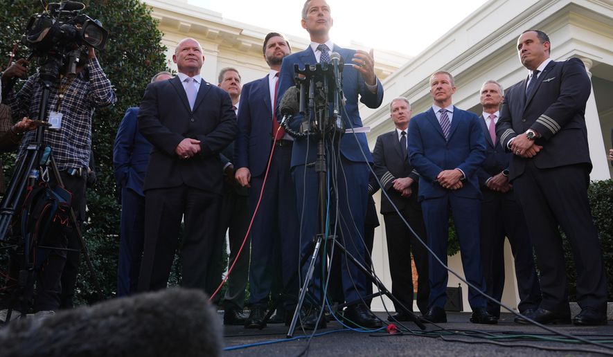 Transportation Secretary Sean Duffy speaks to the media alongside Sean O'Brien, President of the International Brotherhood of Teamsters, from left, Chris Sununu, president & CEO of Airlines for America, Vice President JD Vance and aviation industry representatives, about the impact of the government shutdown on the aviation industry, outside of the West Wing of the White House, Thursday, Oct. 30, 2025, in Washington. (AP Photo/Jacquelyn Martin)