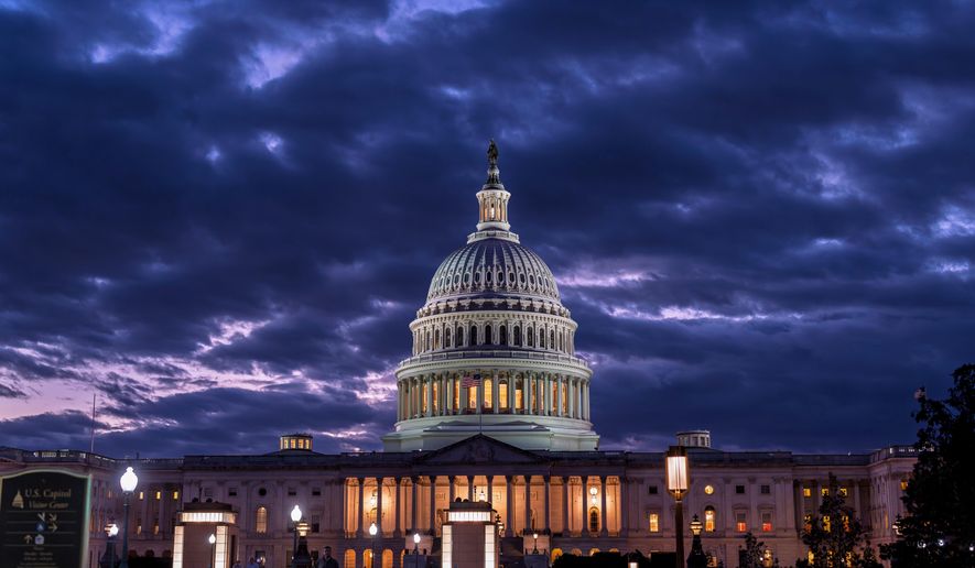 The Capitol is seen at nightfall on day 22 of a government shutdown in Washington, Oct. 22, 2025. (AP Photo/J. Scott Applewhite) **FILE**