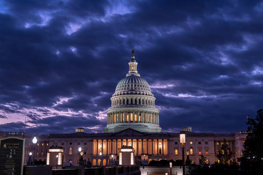The Capitol is seen at nightfall on day 22 of a government shutdown in Washington, Oct. 22, 2025. (AP Photo/J. Scott Applewhite) **FILE**