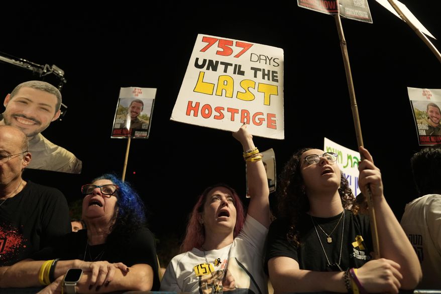 Relatives and supporters of hostages held by Hamas in the Gaza Strip attend a rally calling for their immediate release in Tel Aviv, Israel, Saturday, Nov. 1, 2025. (AP Photo/Mahmoud Illean)