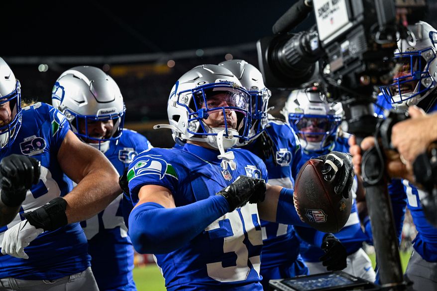 Seattle Seahawks safety Ty Okada (39) dances for the television camera after intercepting a pass attempt by Washington Commanders quarterback Jayden Daniels (5) at Northwest Stadium in Landover, Maryland, November 2, 2025. (Photo by Brian Murphy for the Washington Times)