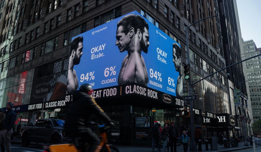 Advertisements by the American company Polymarket predict a victory for Zohran Mamdani in the New York City mayoral election on Tuesday, Nov. 4, 2025, in New York. (AP Photo/Olga Fedorova) **FILE**