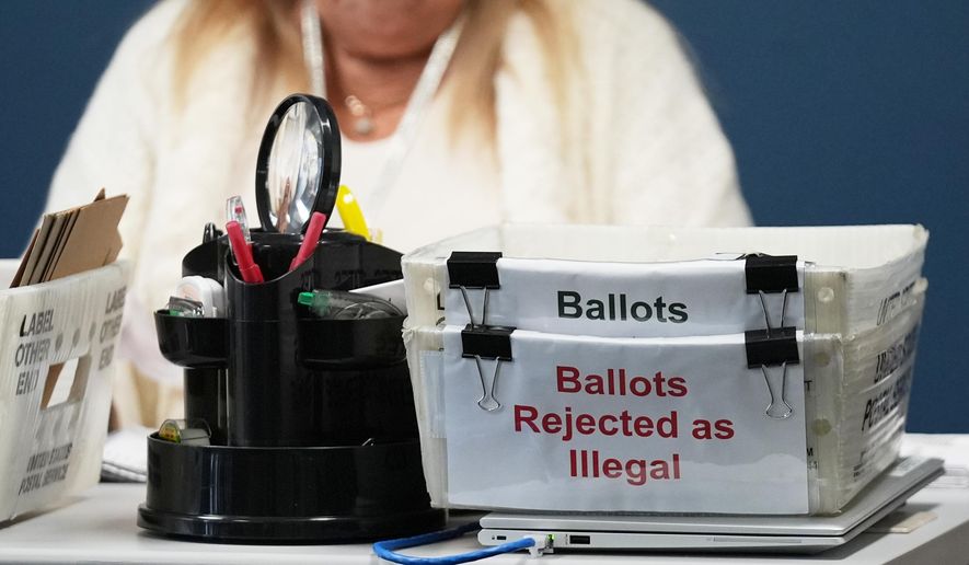 Employees sort vote-by-mail ballots from municipal elections on Election Day at the Miami-Dade County Supervisor of Elections Office, Tuesday, Nov. 4, 2025, in Doral, Fla. (AP Photo/Lynne Sladky)