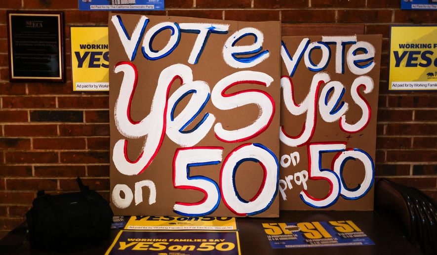 Posters at the IBEW Local 6 headquarters ahead of a campaign event in support of Proposition 50 in San Francisco, Monday, Nov. 3, 2025. (Gabrielle Lurie/San Francisco Chronicle via AP)
