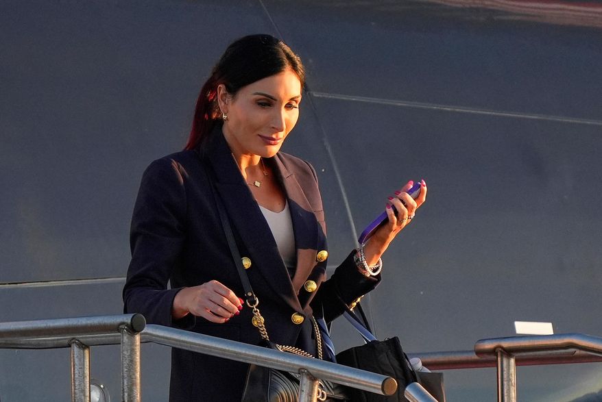 Laura Loomer arrives at Philadelphia International Airport, Sept. 10, 2024, in Philadelphia. (AP Photo/Chris Szagola, File)