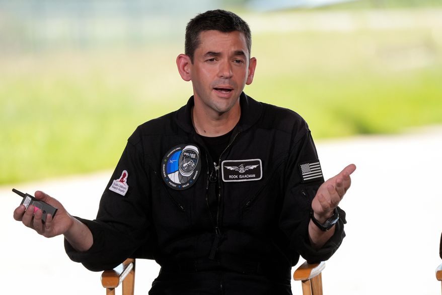 Jared Isaacman speaks at a news conference after arriving at the Kennedy Space Center for an upcoming private human spaceflight mission in Cape Canaveral, Fla., Aug. 19, 2024. (AP Photo/John Raoux, File)