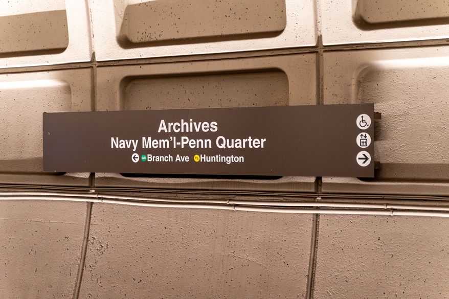 Sign for the Archives Navy Memorial Penn Quarter Metrorail station in Washington, D.C. File photo credit: melissamn via Shutterstock.