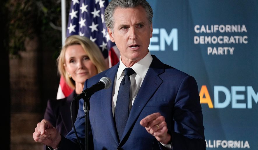 California Gov. Gavin Newsom speaks as he stands with first partner Jennifer Siebel Newsom during an election night press conference at a California Democratic Party office Tuesday, Nov. 4, 2025, in Sacramento, Calif. (AP Photo/Godofredo A. Vásquez)