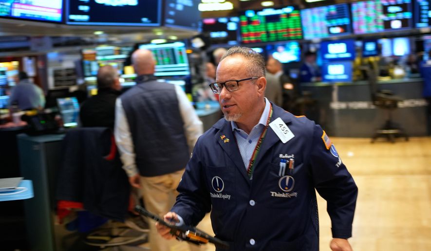 Robert Arciero works on the floor at the New York Stock Exchange in New York, Wednesday, Oct. 29, 2025. (AP Photo/Seth Wenig)
