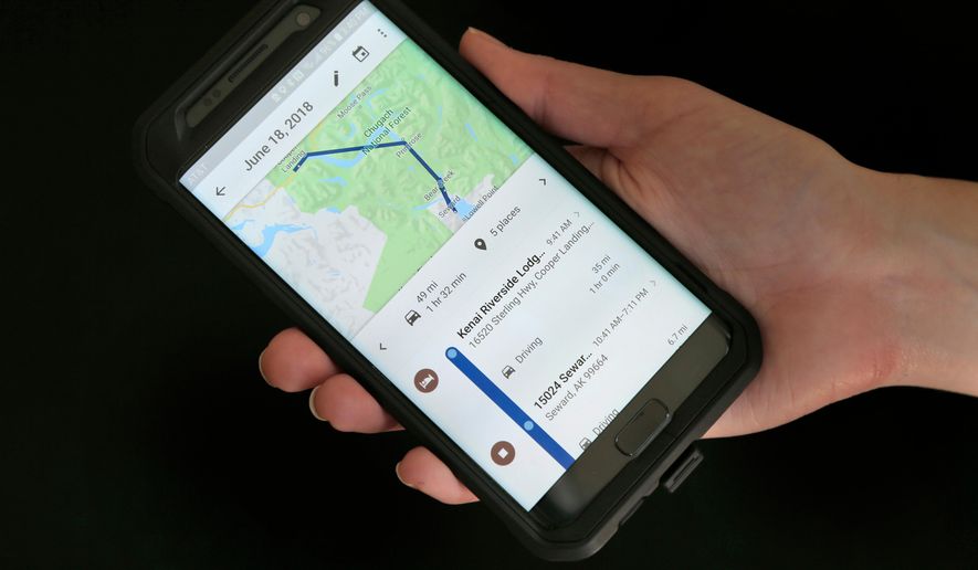 In this Aug. 8, 2018, file photo, a mobile phone displays a user's travels using Google Maps in New York. (AP Photo/Seth Wenig, File)