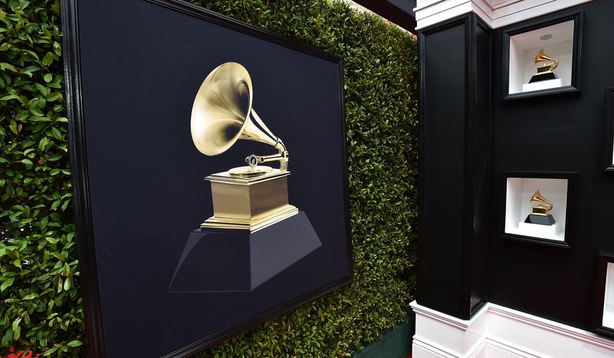Decorative Grammy Awards appear on the red carpet at the 64th annual Grammy Awards in Las Vegas on April 3, 2022. (Photo by Jordan Strauss/Invision/AP) **FILE**