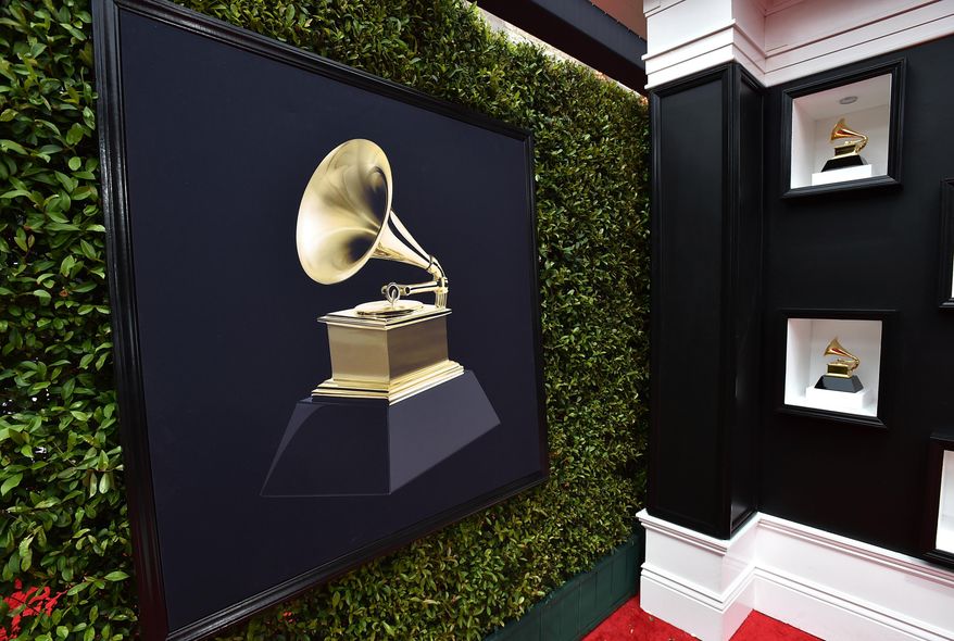 Decorative Grammy Awards appear on the red carpet at the 64th annual Grammy Awards in Las Vegas on April 3, 2022. (Photo by Jordan Strauss/Invision/AP) **FILE**