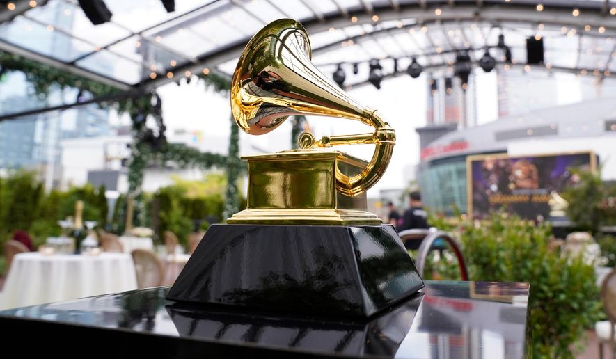 FILE - A decorative Grammy Award is displayed before the start of the 63rd annual Grammy Awards in Los Angeles on March 14, 2021. (AP Photo/Chris Pizzello, File)