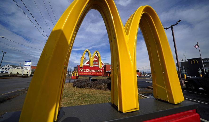 FILE - McDonald's restaurant signs are shown in in East Palestine, Ohio, Feb. 9, 2023. (AP Photo/Gene J. Puskar, File)