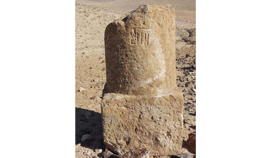 This photo provided by Adam Pažout shows a fragment of a Roman milestone that was erected along the road Via Nova Traiana in Jordan. (Adam Pažout/Itiner-e via AP)