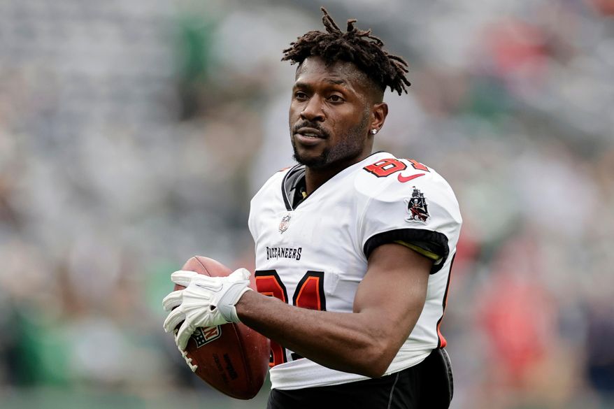 FILE - Tampa Bay Buccaneers wide receiver Antonio Brown (81) walks on the field during an NFL football game against the New York Jets, Jan. 2, 2022, in East Rutherford, N.J. (AP Photo/Adam Hunger, File)