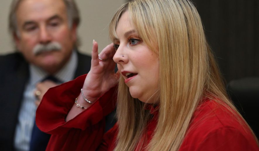 Abby Zwerner, a teacher who was shot at Richneck Elementary School in Newport News, Va., by her 6-year-old student in 2023, talks to reporter Peter Dujardin, Jan. 3, 2024, in Virginia Beach, Va. (Stephen M. Katz /The Virginian-Pilot via AP)