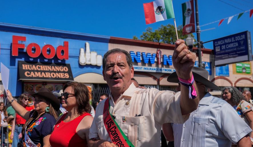 U.S. Rep. Jesús "Chuy" García marches in the Mexican Independence Day Parade, Sept. 14, 2025, in the Little Village neighborhood of Chicago. (AP Photo/Erin Hooley, File)