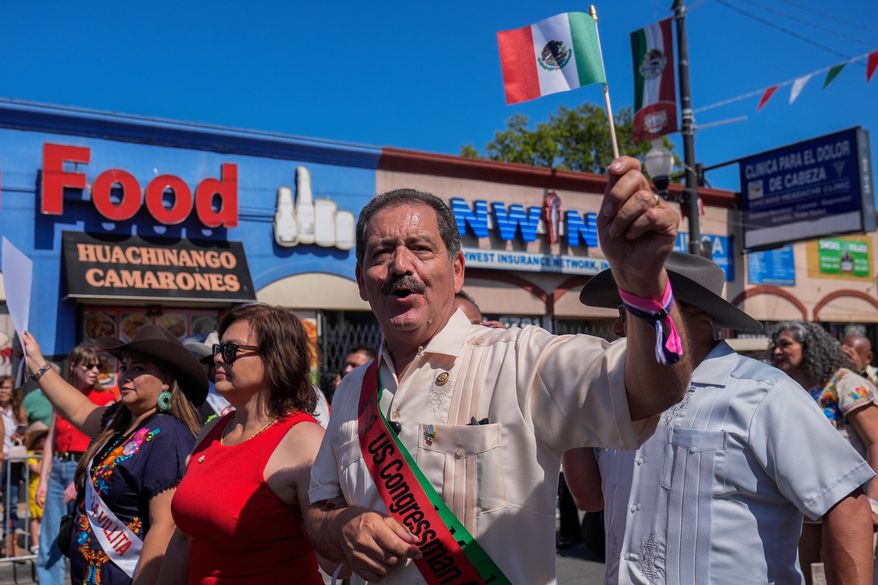 U.S. Rep. Jesús "Chuy" García marches in the Mexican Independence Day Parade, Sept. 14, 2025, in the Little Village neighborhood of Chicago. (AP Photo/Erin Hooley, File)