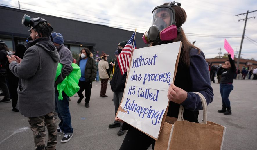 Protesters gather outside an ICE processing facility in the Chicago suburb of Broadview, Ill., Saturday, Nov. 1, 2025. (AP Photo/Alex Brandon) ** FILE **