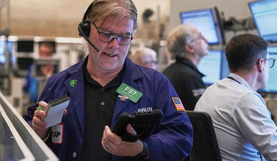 Options trader Brian Garvey works on the floor of the New York Stock Exchange, Thursday, Nov. 6, 2025. (AP Photo/Richard Drew)