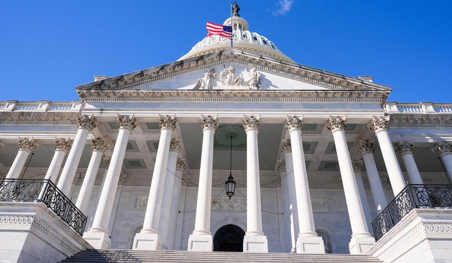 The U.S. Capitol is photographed on 37th day of the government shutdown, Thursday, Nov. 6, 2025, in Washington. (AP Photo/Mariam Zuhaib)