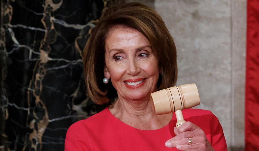 House Speaker Nancy Pelosi of California holds the gavel at the Capitol in Washington, Jan. 3, 2019. (AP Photo/Carolyn Kaster, File)