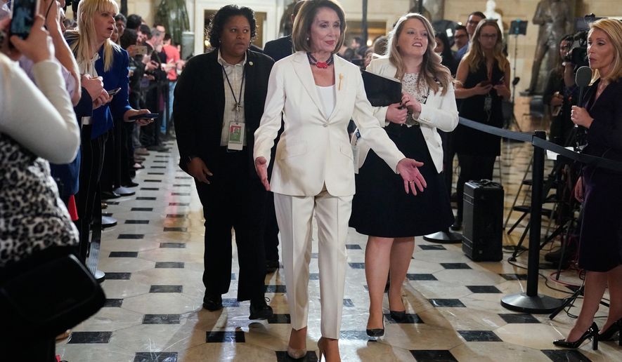 FILE - House Speaker Nancy Pelosi, D-Calif., arrives to listen to President Donald Trump deliver his State of the Union address to a joint session of Congress on Capitol Hill in Washington, Feb. 5, 2019. (AP Photo/Carolyn Kaster, File)