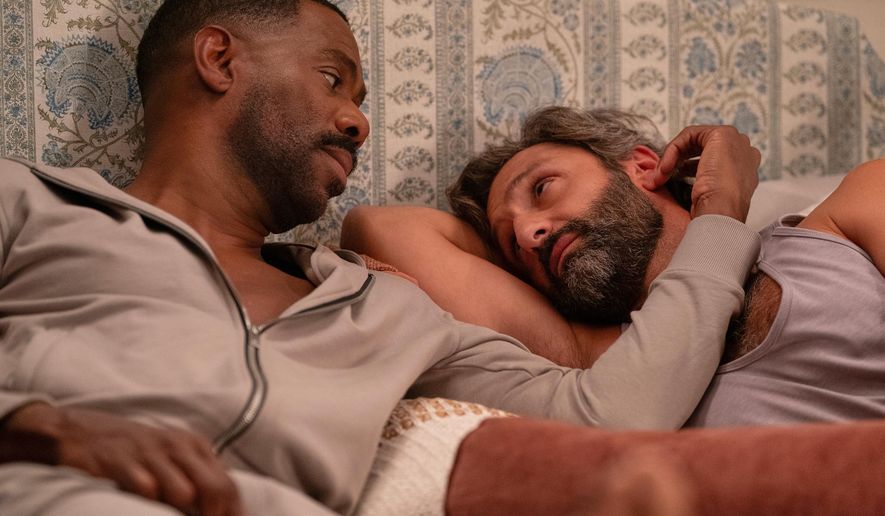This image released by Netflix shows Colman Domingo, left, and Marco Calvani in a scene from "The Four Seasons." (Jon Pack/Netflix via AP)