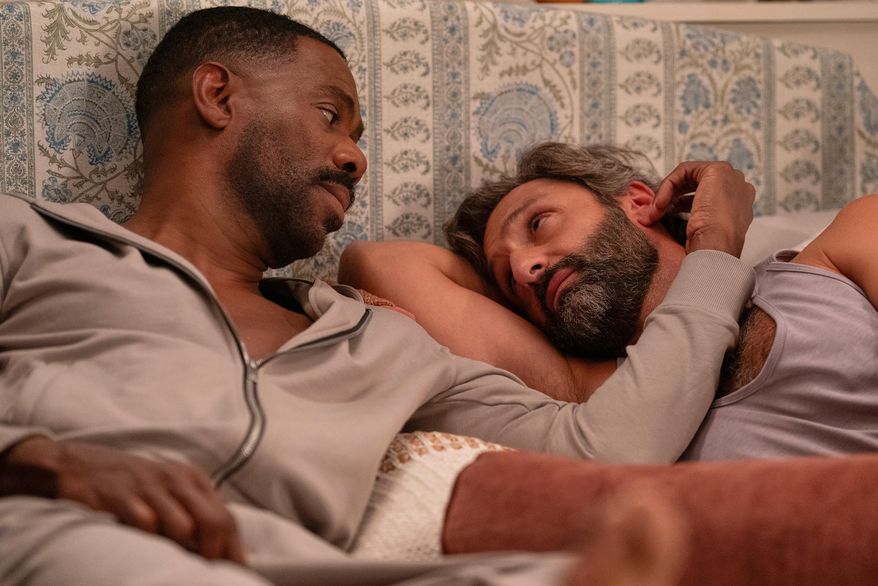 This image released by Netflix shows Colman Domingo, left, and Marco Calvani in a scene from "The Four Seasons." (Jon Pack/Netflix via AP)