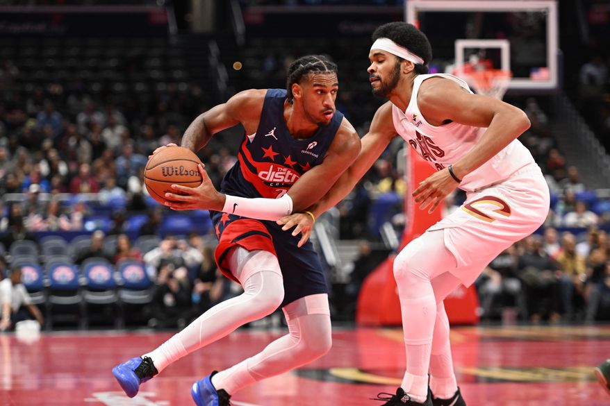 Washington Wizards center Alex Sarr (20) about to drive towards the basket and being defended by Cleveland Cavaliers center Jarrett Allen (31) during the first quarter of an NBA game at Capital One Arena in Washington D.C., November 7, 2025. (Photo for the Washington Times)