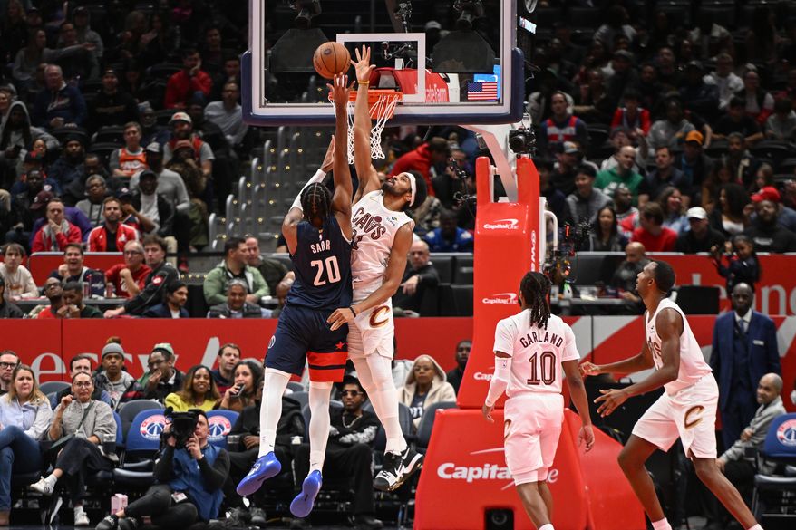 Washington Wizards center Alex Sarr (20) getting a shot blocked by Cleveland Cavaliers center Jarrett Allen (31) during the second quarter of an NBA game at Capital One Arena in Washington D.C., November 7, 2025. (Photo for the Washington Times)