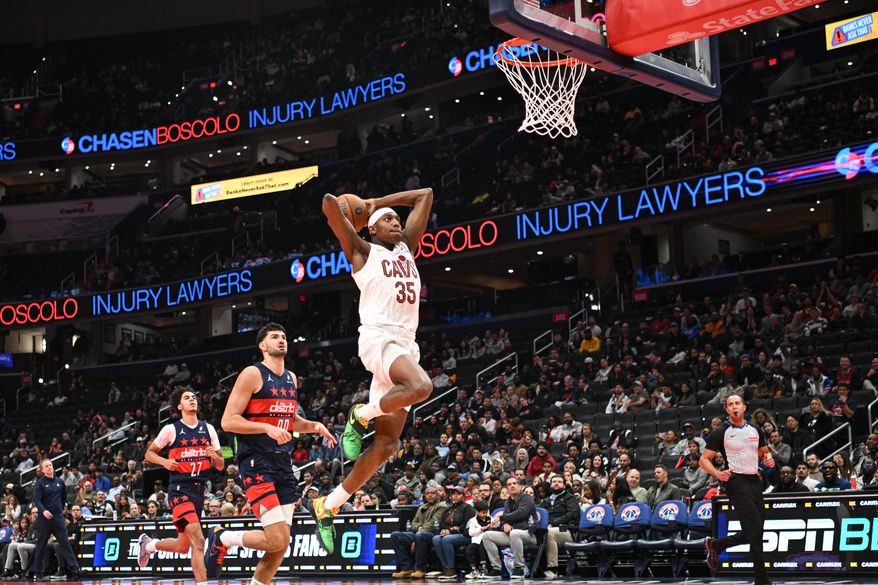 Cleveland Cavaliers forward Nae’Qwan Tomlin about to dunk the ball during the fourth quarter of an NBA game against the Washington Wizards at Capital One Arena in Washington D.C., November 7, 2025. (Photo for the Washington Times)