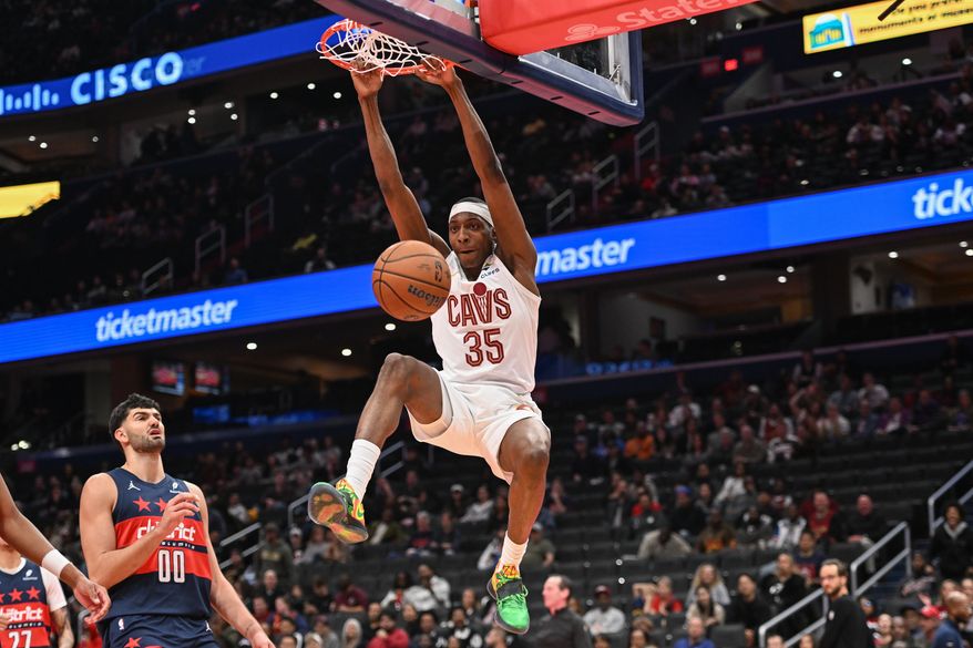 Cleveland Cavaliers forward Nae’Qwan Tomlin duking the ball during the fourth quarter of an NBA game against the Washington Wizards at Capital One Arena in Washington D.C., November 7, 2025. (Photo for the Washington Times)