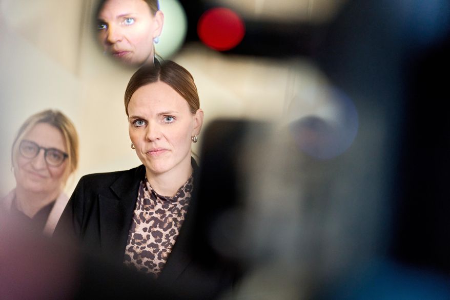 Caroline Stage, Danish Minister for Digitalization and representatives from the agreement parties attends a press conference about a new political agreement for better protection of children and young people online, in Copenhagen, Friday, Nov. 7, 2025. (Thomas Traasdahl/Ritzau Scanpix via AP)
