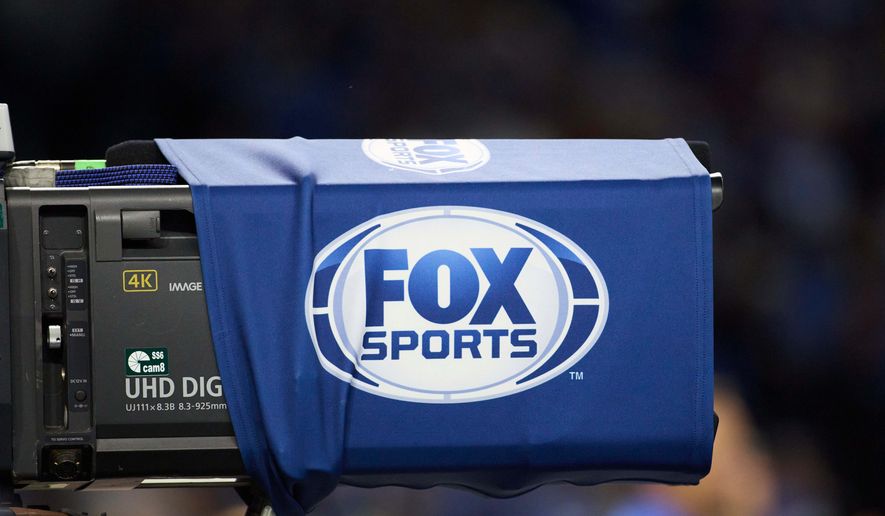 FILE - Fox Sports logo on a camera during an NFL football game between the Tennessee Titans and Detroit Lions in Detroit, Oct. 27, 2024. (AP Photo/Rick Osentoski, File)
