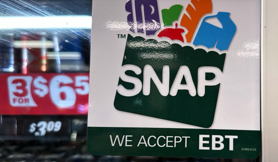SNAP EBT information sign is displayed at a gas station in Riverwoods, Ill., Saturday, Nov. 1, 2025. (AP Photo/Nam Y. Huh) **FILE**