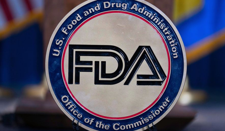 FILE - The Food and Drug Administration seal is seen at the Hubert Humphrey Building Auditorium in Washington, April 22, 2025. (AP Photo/Jose Luis Magana, File)