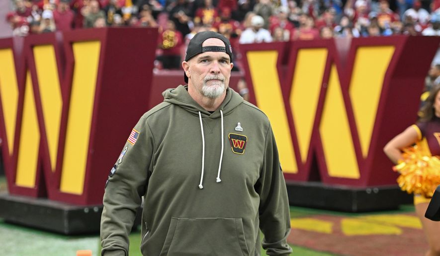 Washington Commanders head coach Dan Quinn walking on the field before the start of an NFL game against the Detroit Lions at Northwest Stadium in Landover, MD, November 9, 2025. (Photo for the Washington Times)